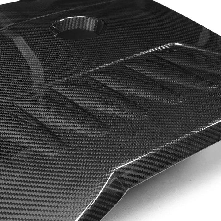 BMW M340i B58 dry carbon fibre engine cover close-up
