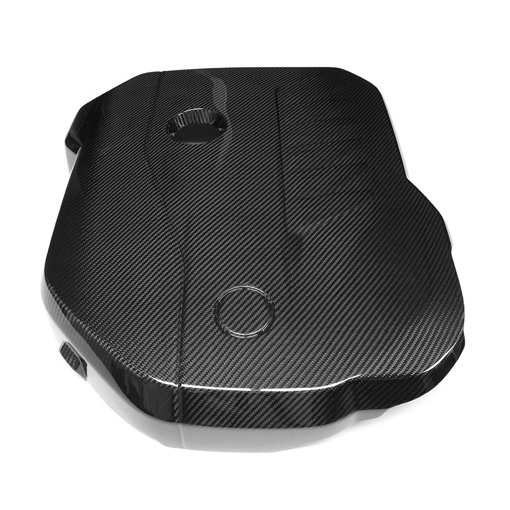 Dry carbon fibre engine cover for BMW B58 engine showing weave