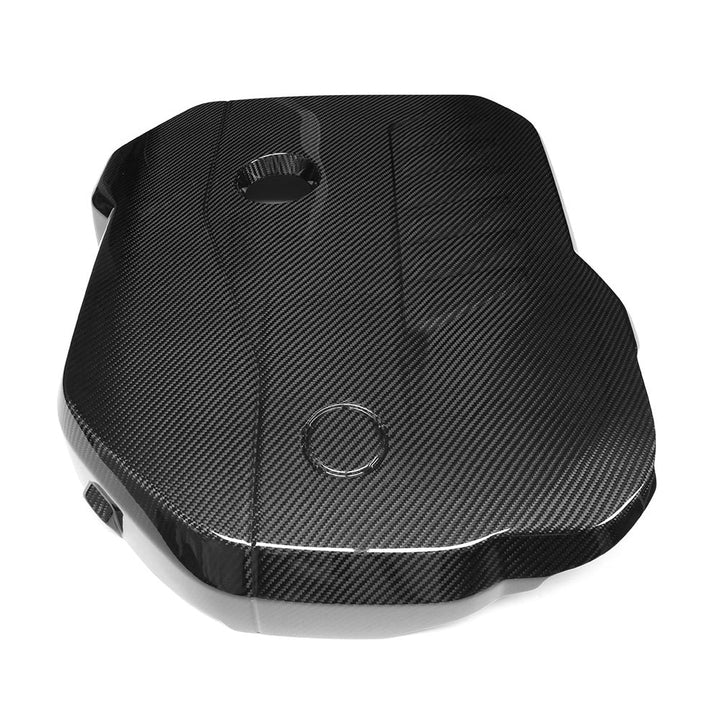 Dry carbon fibre engine cover for BMW B58 engine showing weave