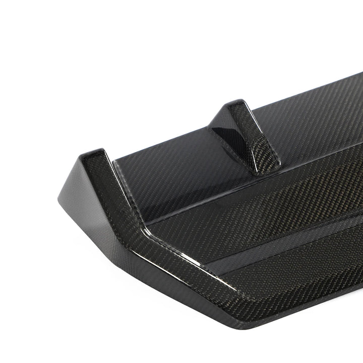 BMW G42 M Sport rear bumper diffuser dry carbon fibre close up