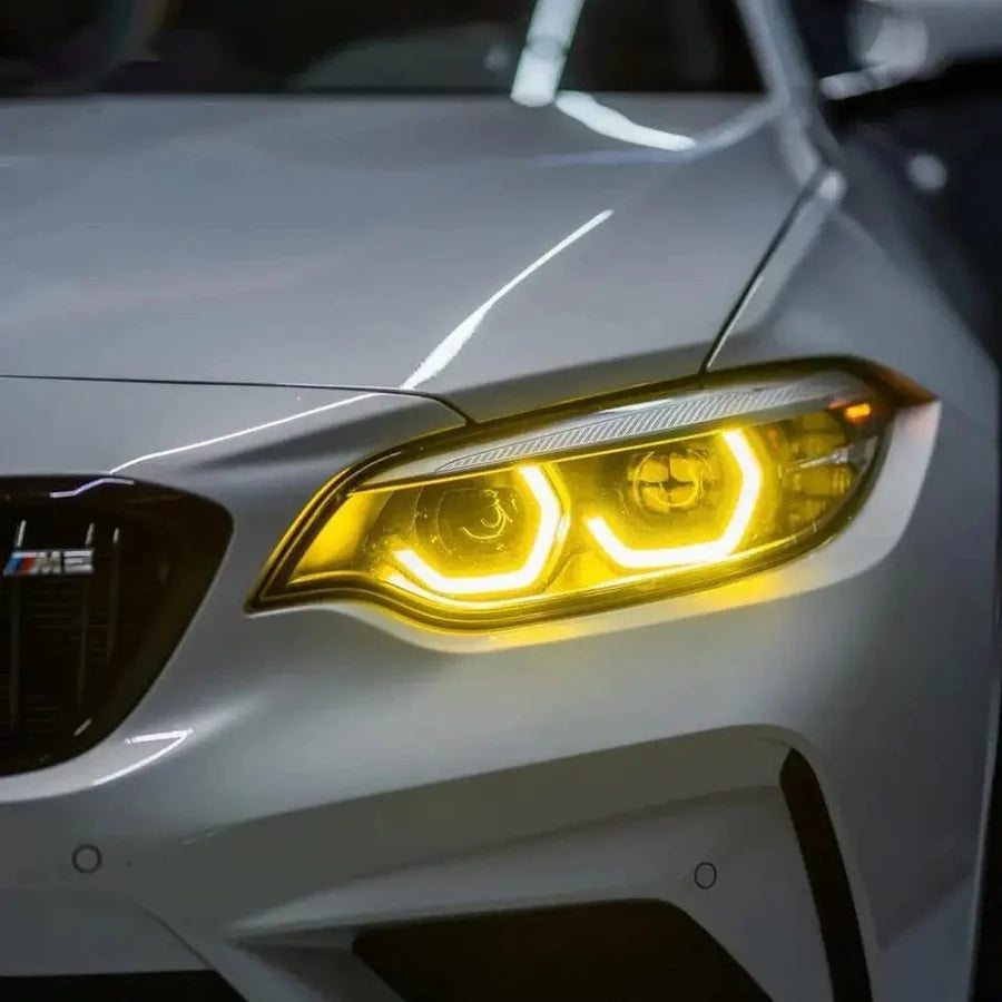 BMW M2 M2C F87 LCI yellow adaptive DRL fitted close up
