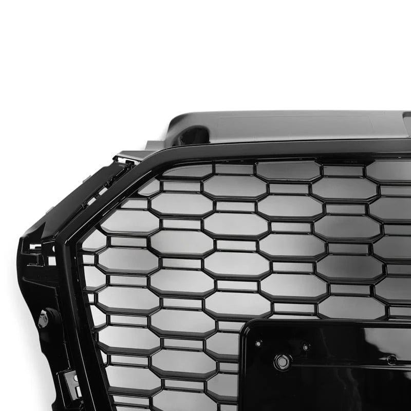 Audi A3 S3 8V V2 honeycomb front grille on a plain background close up