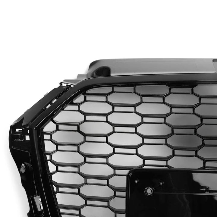Audi A3 S3 8V V2 honeycomb front grille on a plain background close up