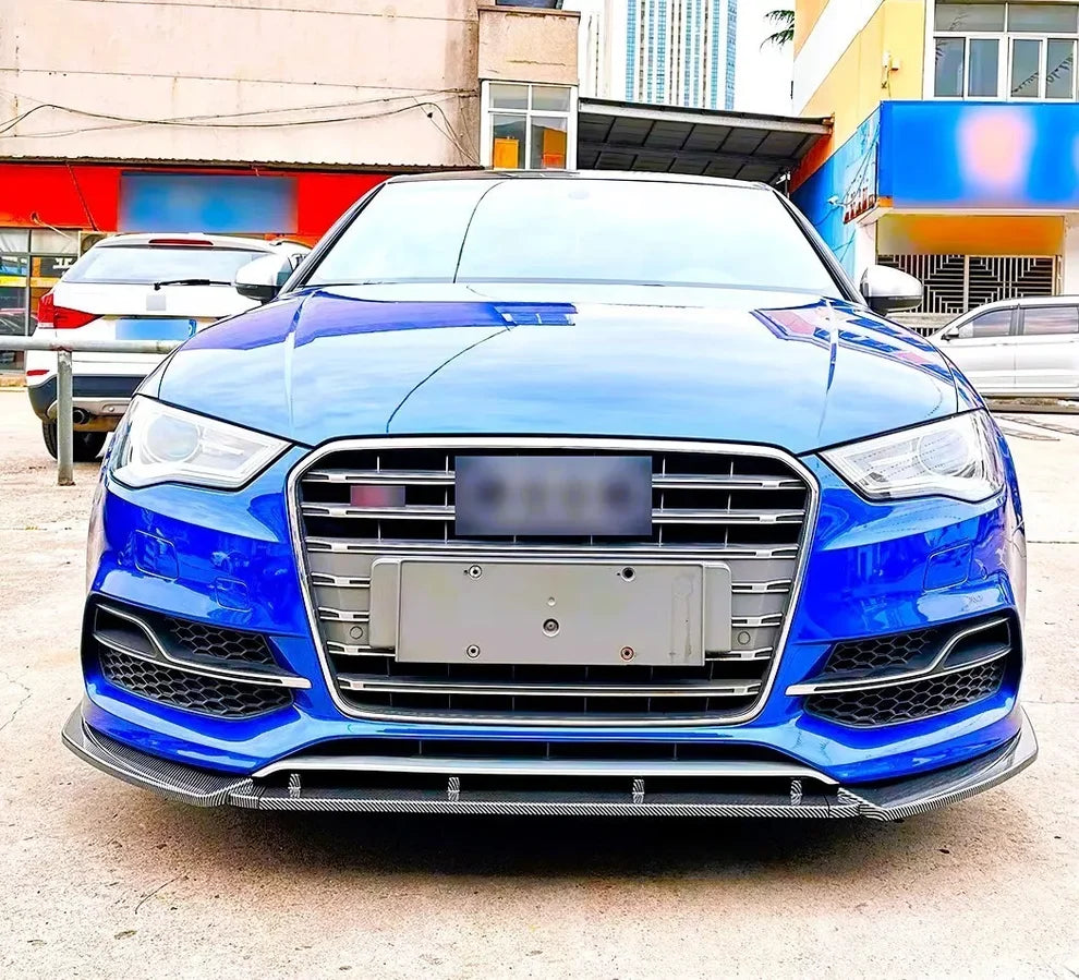 Gloss black front splitter fitted to Audi S3 8V saloon, front view