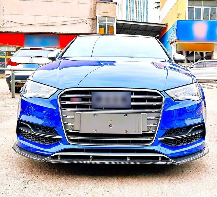 Gloss black front splitter fitted to Audi S3 8V saloon, front view