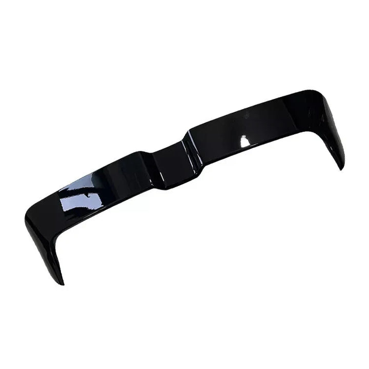 Gloss black ABS rear roof spoiler for Audi A3 S3 RS3 8Y on a plain background angle shot