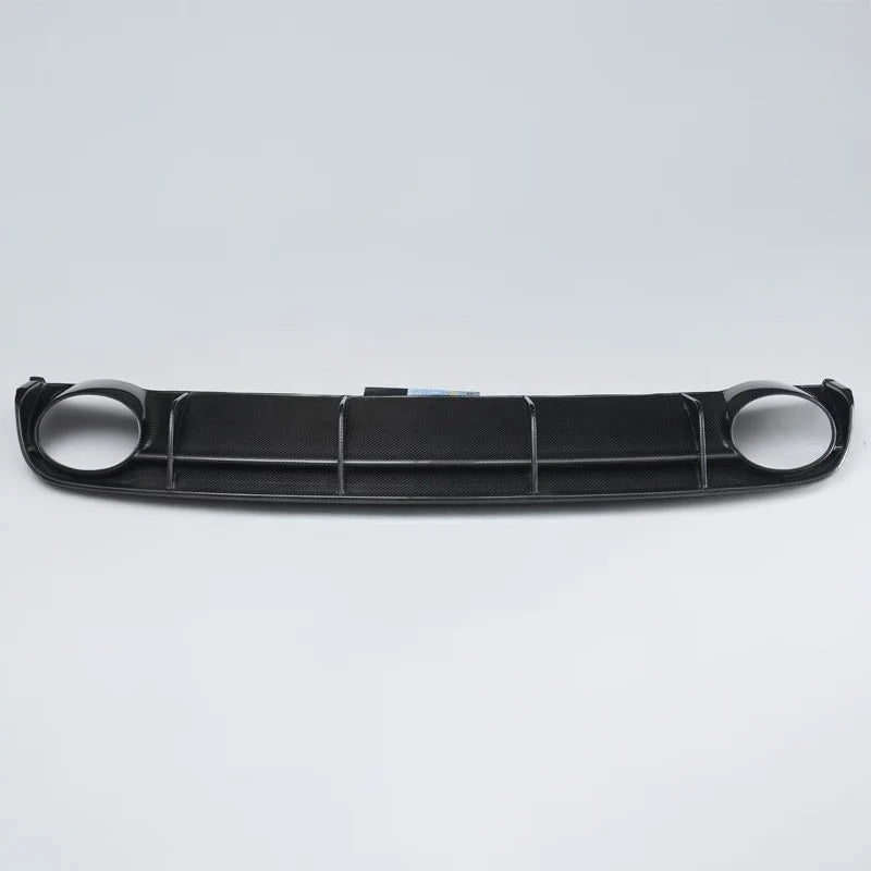 Carbon fibre rear diffuser for Audi RS6 C7 on a plain background
