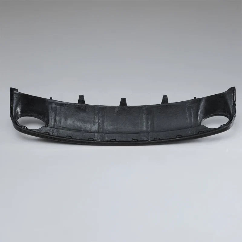Carbon fibre rear diffuser for Audi RS6 C7 on a plain background rear side