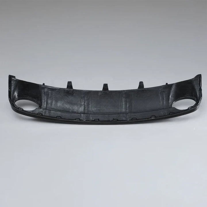 Carbon fibre rear diffuser for Audi RS6 C7 on a plain background rear side