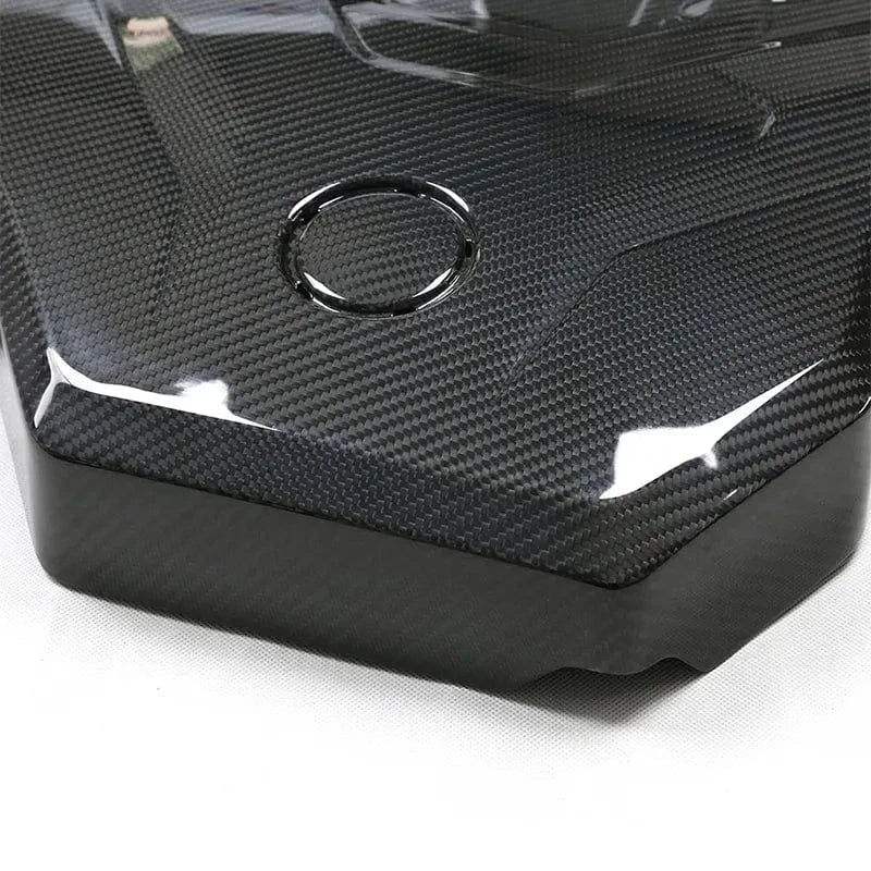 BMW G42 220i dry carbon fibre engine cover close-up