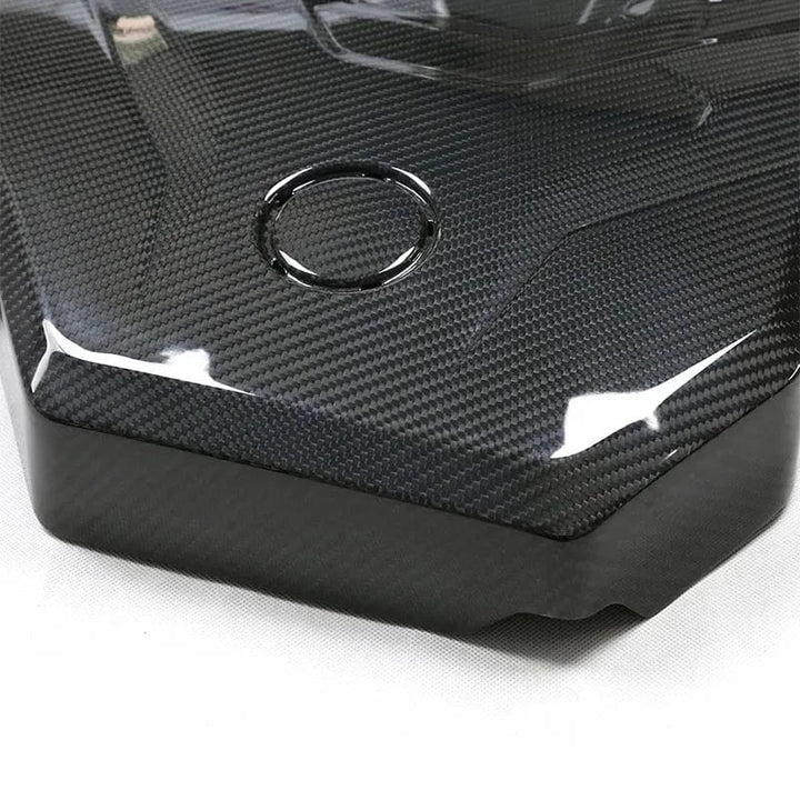 BMW G42 220i dry carbon fibre engine cover close-up