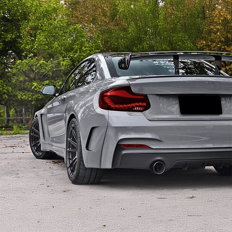 BMW 2 Series F22 with OLED red rear tail lights, rear three-quarter view