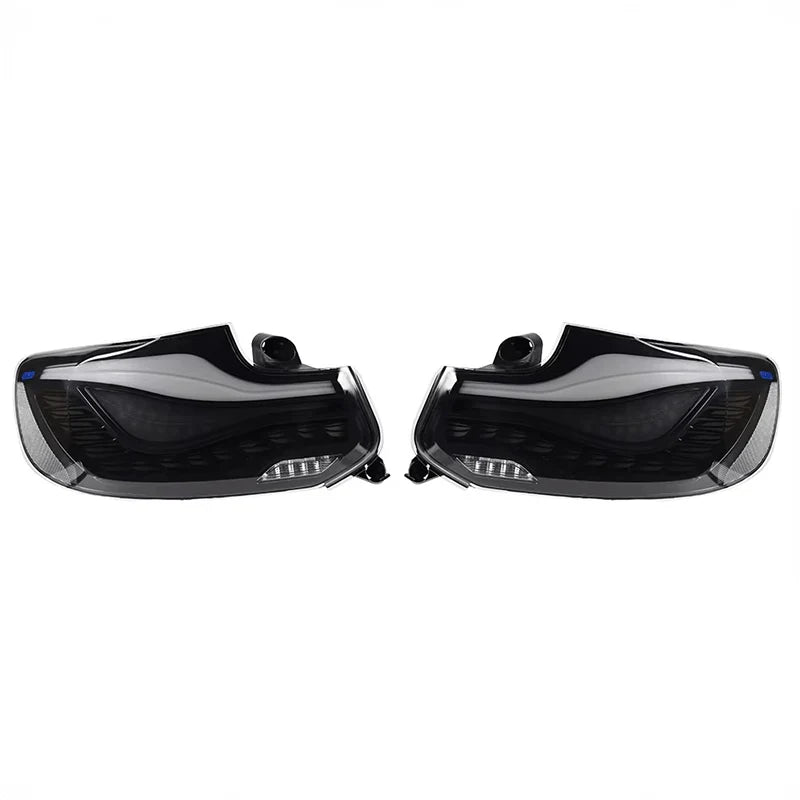 OLED smoked black plug and play rear tail lights for BMW 2 Series M2 on a plain background