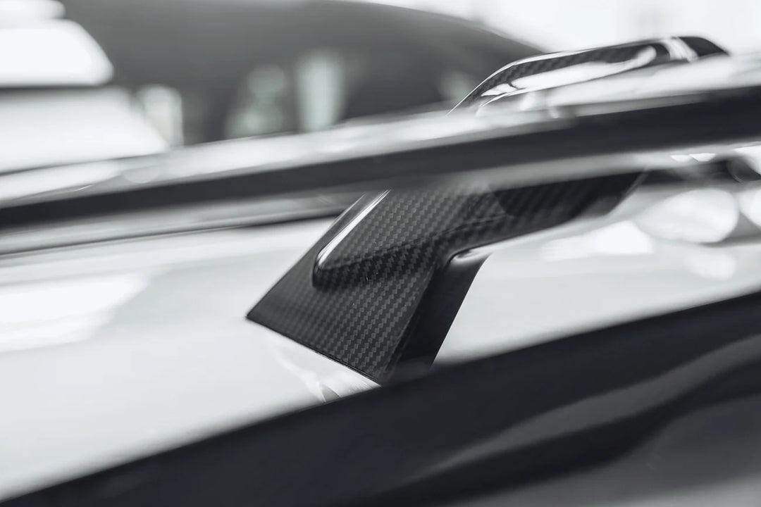 Dry carbon fibre wing spoiler for BMW F30 showing weave