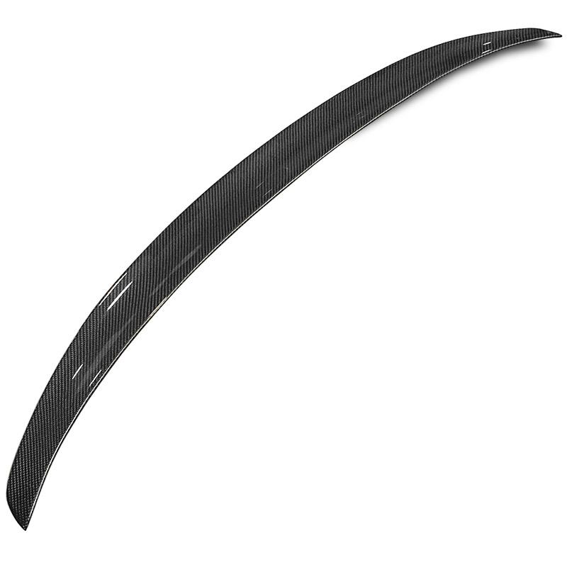 Pre-preg carbon fibre rear spoiler for BMW 4 Series on a plain background