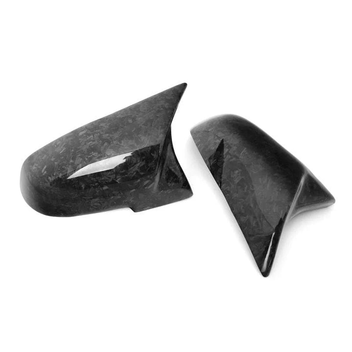 Forged carbon fibre mirror cover for BMW F22 2 Series showing the marbled pattern