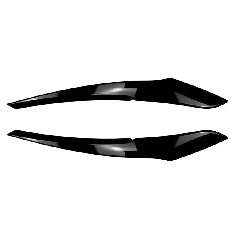 1 Series pre-facelift gloss black ABS headlight trim pair
