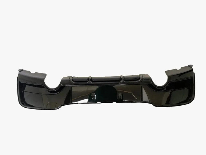 Gloss black rear diffuser V1 for BMW F20 F21 Pre-LCI showing dual exhaust cut-outs