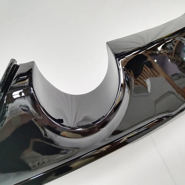 Gloss black rear diffuser for BMW F22 M Sport showing dual exhaust cut-outs