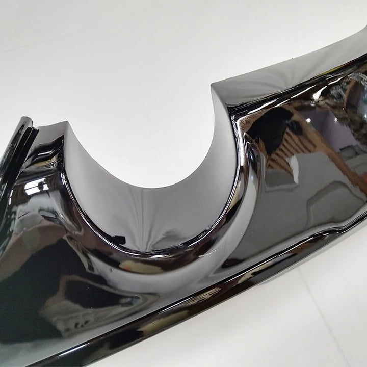 Gloss black rear diffuser for BMW F22 M Sport showing dual exhaust cut-outs