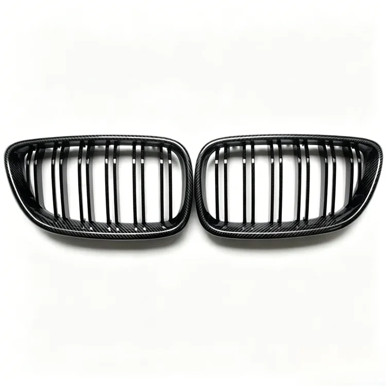Carbon fibre kidney grille for BMW F87 M2 showing weave pattern
