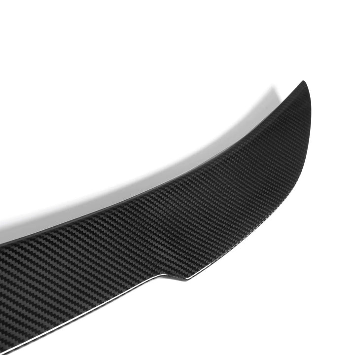 BMW F22 dry carbon fibre spoiler close-up showing weave