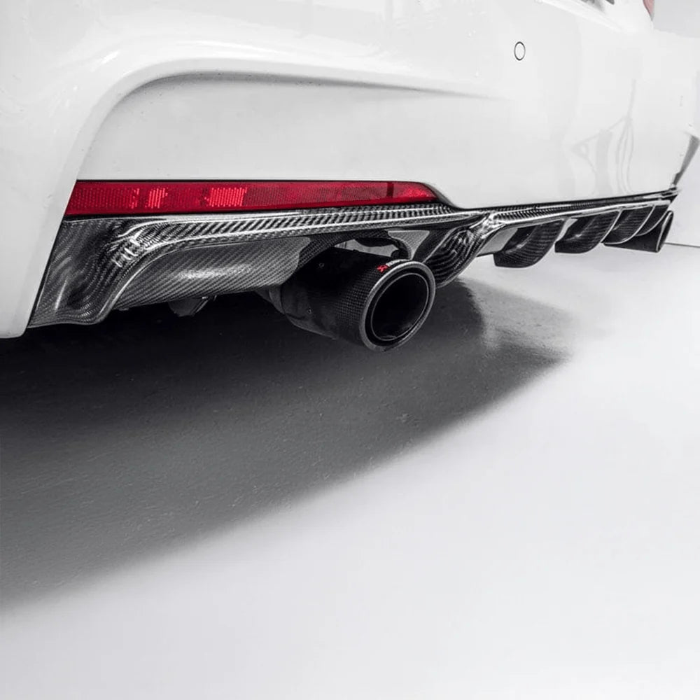BMW 3 Series F31 twin exhaust diffuser installed showing left exhaust
