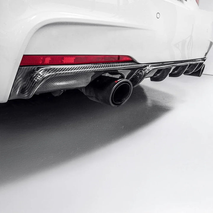 BMW 3 Series F31 twin exhaust diffuser installed showing left exhaust