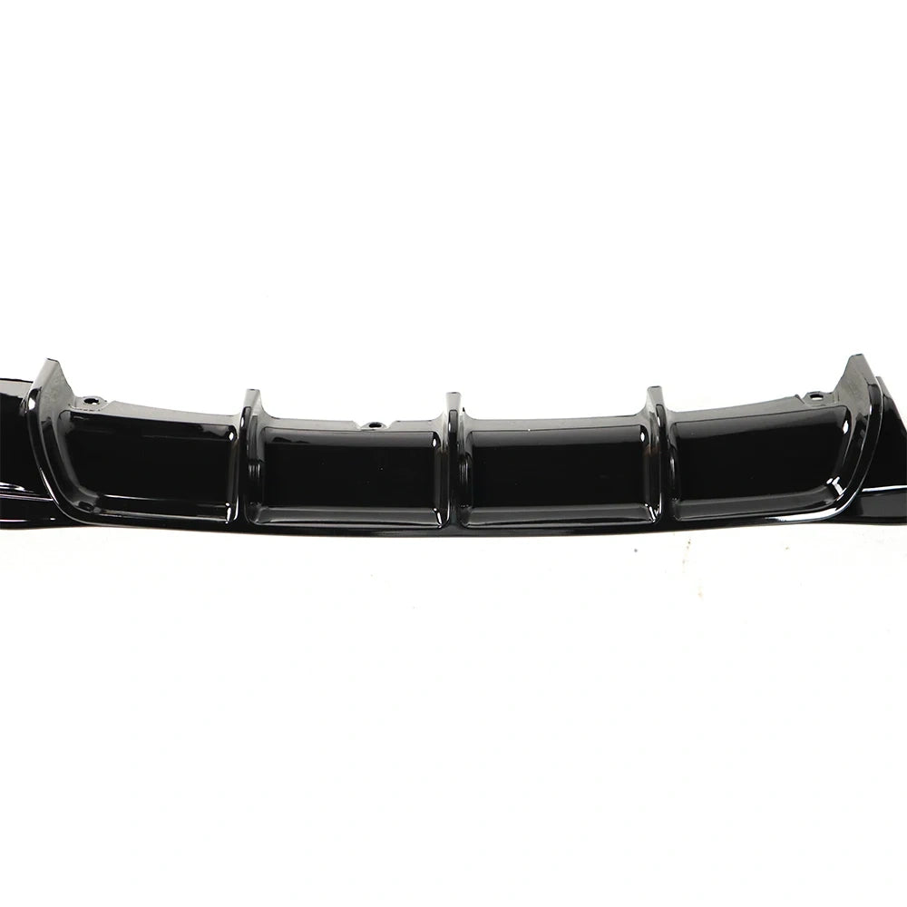 BMW F30 LCI M Sport gloss black rear diffuser close-up surface detail