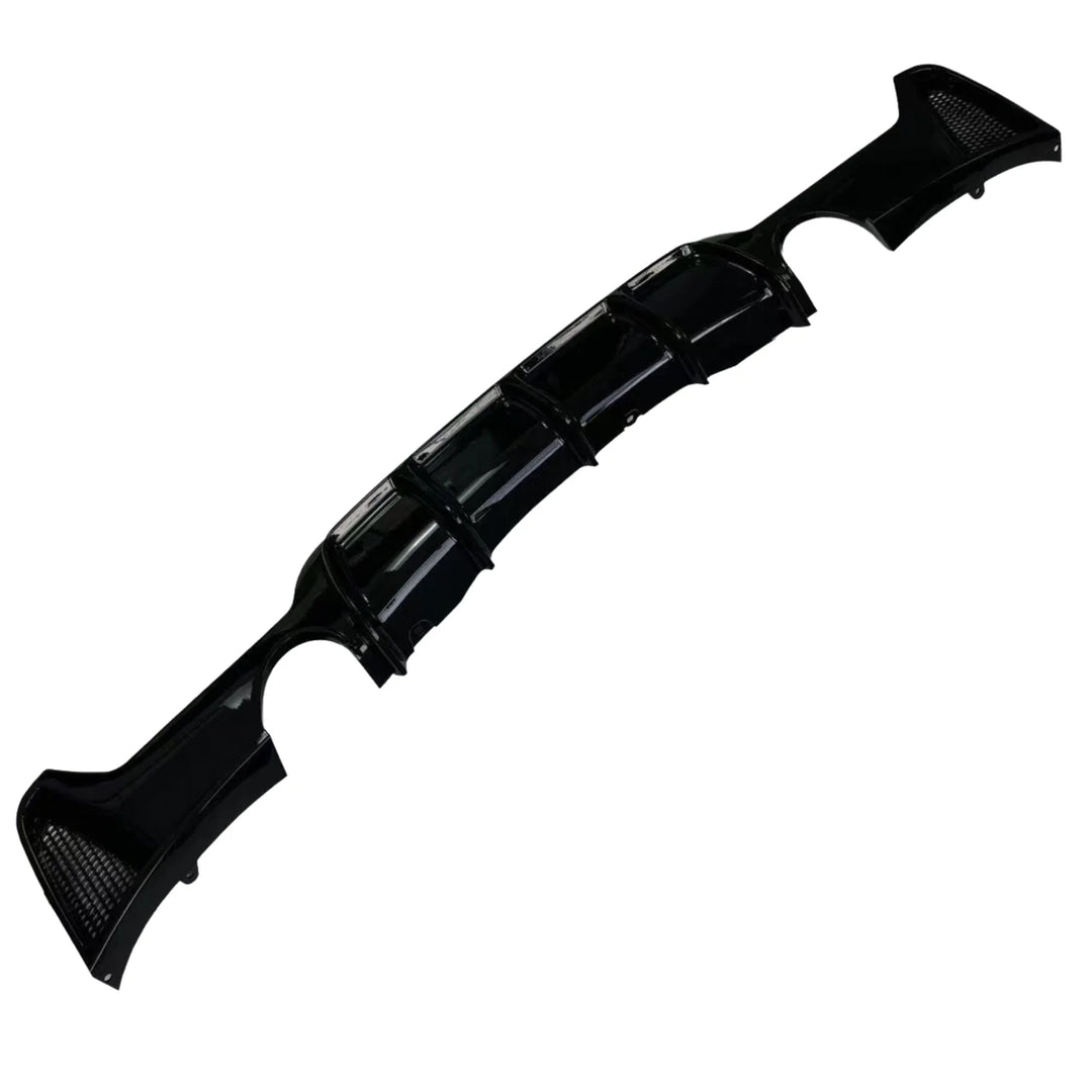 Gloss black rear diffuser for BMW F32 M Sport showing dual exhaust cut-outs one each side