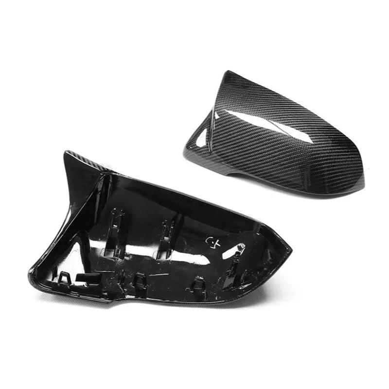 Carbon fibre mirror cover for BMW X1 F48 showing weave pattern