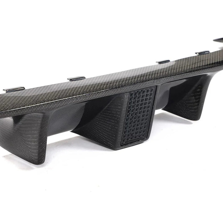 Carbon fibre diffuser V4 for BMW M3 F80 showing brake light detail