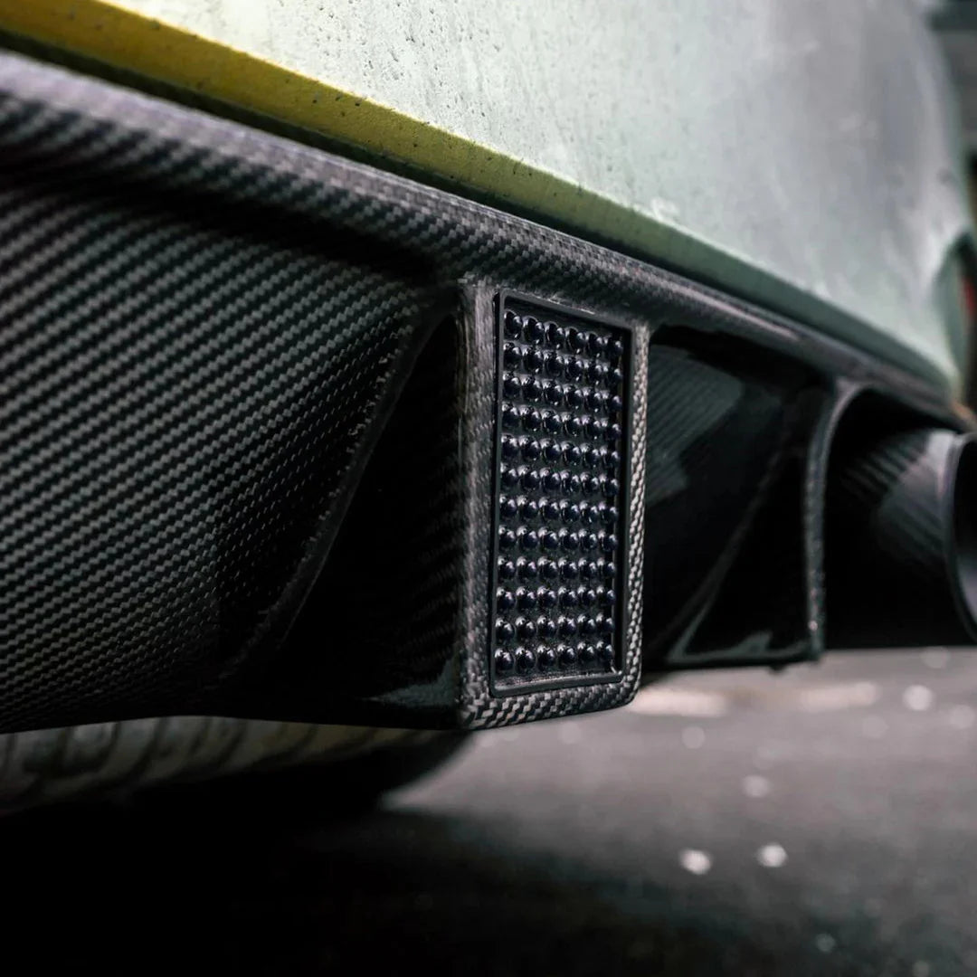 BMW M4 F83 diffuser V4 high gloss finish close-up