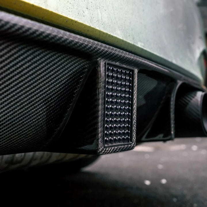 BMW M4 F83 diffuser V4 high gloss finish close-up