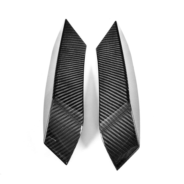 BMW M4 F82 carbon fibre upper canard close-up showing weave