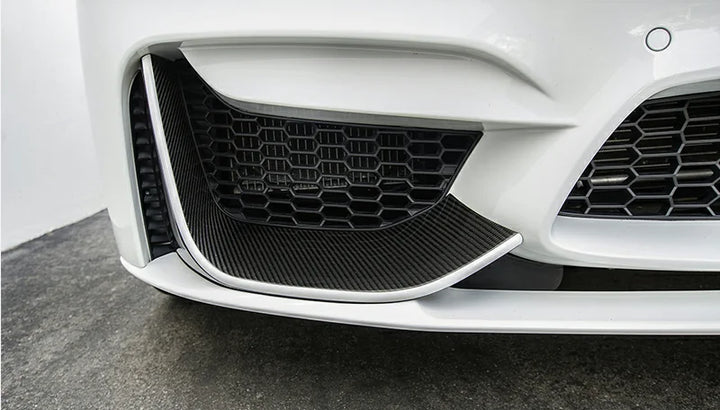 BMW M4 F82 fitted with real carbon fibre front canards installed close-up