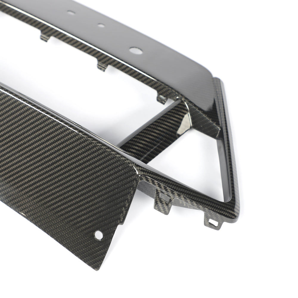 Dry carbon fibre lower grille trim for BMW X5M F95 showing weave