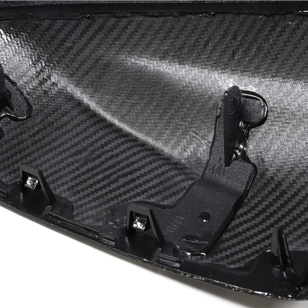 Dry carbon fibre mirror cover for BMW X5M showing weave