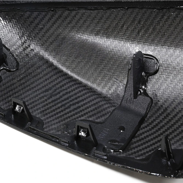 Dry carbon fibre mirror cover for BMW X5M showing weave
