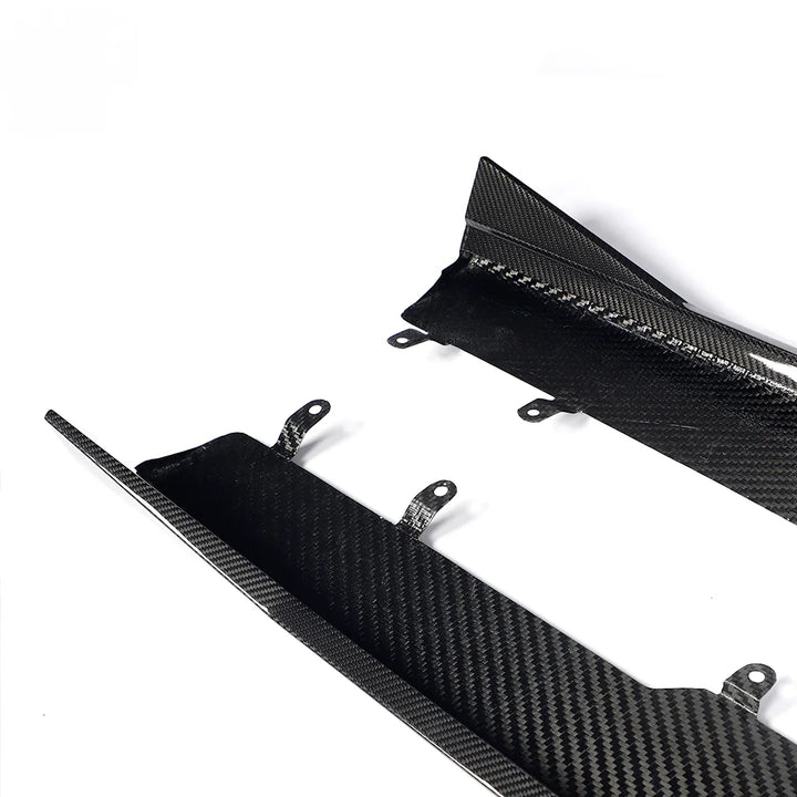 Dry carbon fibre side skirt for BMW X5M F95 showing weave