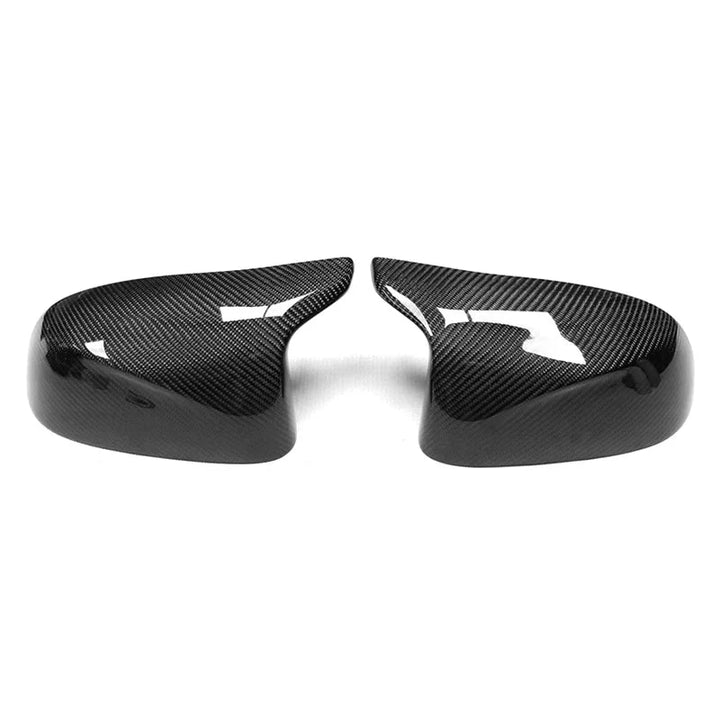 Carbon fibre mirror cover for BMW X5M F95 showing weave pattern