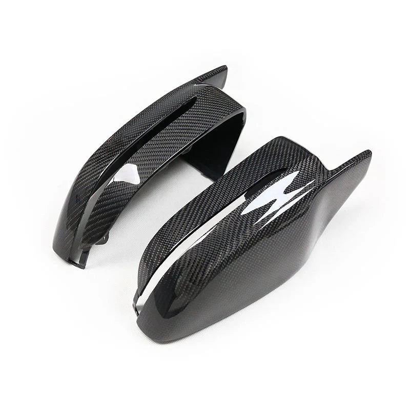 Carbon fibre mirror cover for BMW G15 8 Series showing weave