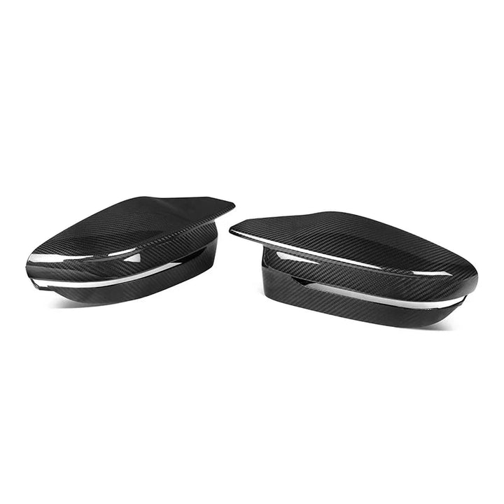 Dry carbon fibre mirror cover for BMW G20 3 Series showing weave