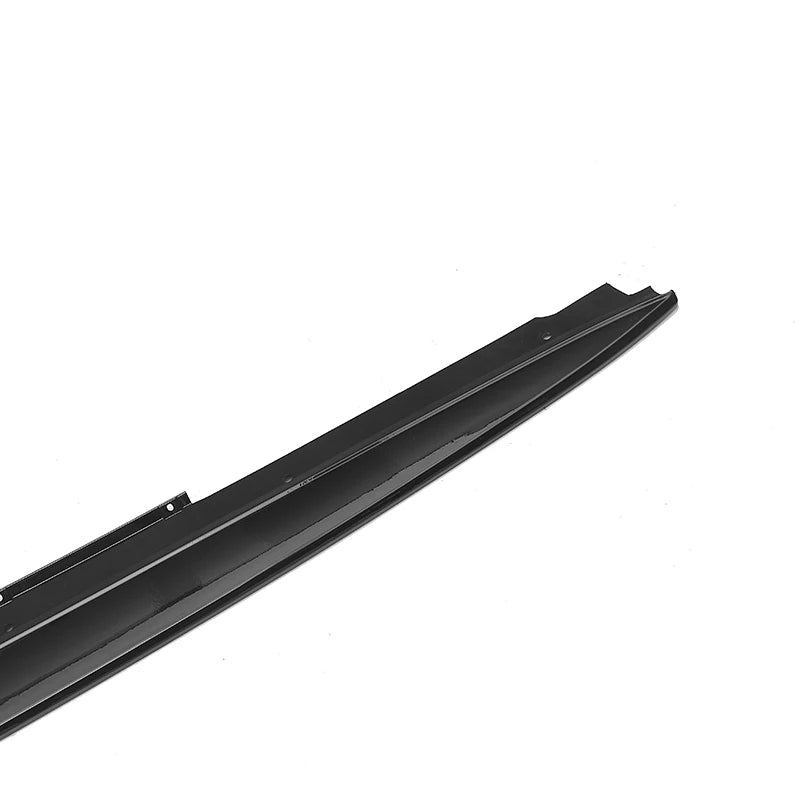 BMW G30 M Sport fitted with gloss black side skirts close up