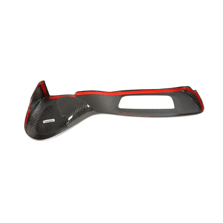 Dry carbon fibre seat control cover for BMW G42 showing weave