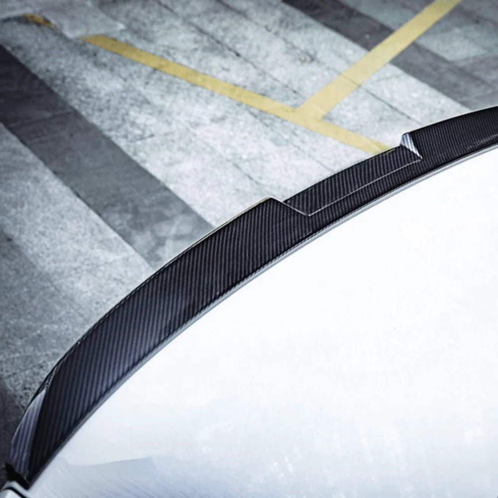 BMW M5 G90 dry carbon fibre spoiler V2 installed