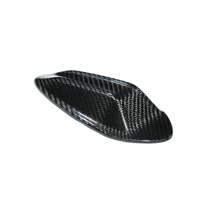 Dry carbon fibre antenna cover for BMW M3 G80 showing weave