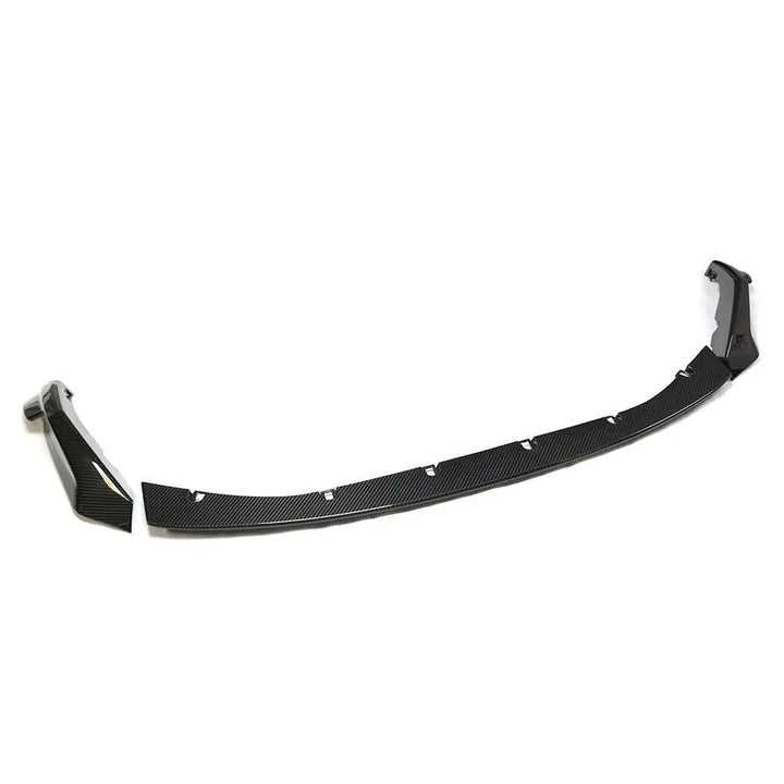 Dry carbon fibre front splitter for BMW G80 M3 showing weave pattern