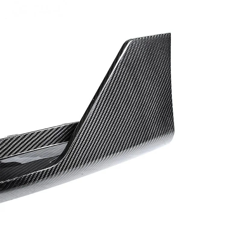 Dry carbon fibre rear bumper corner for BMW M3 G80 showing weave