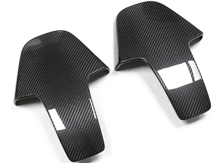 Dry carbon fibre seat back cover for BMW M3 G80 showing weave
